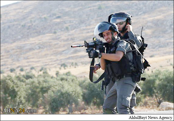 عکس خبری/ نبرد سنگ با گلوله در فلسطین اشغالی