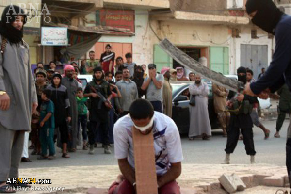 گردن زدن جوان عراقی به دست داعش در استان «الانبار» + عکس 