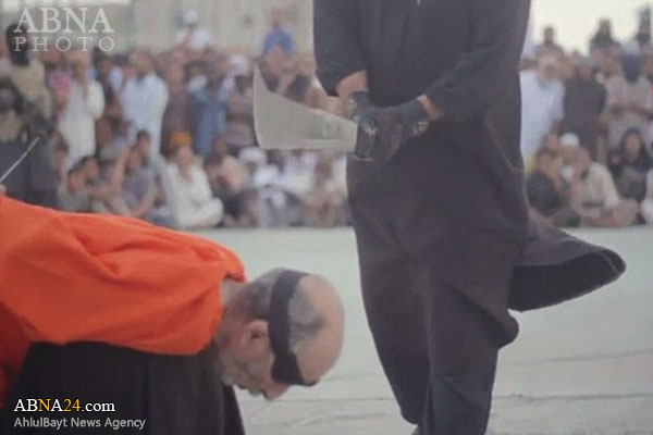 اعدام وحشیانه دو فرد به دست داعش به اتهام جادوگری + عکس