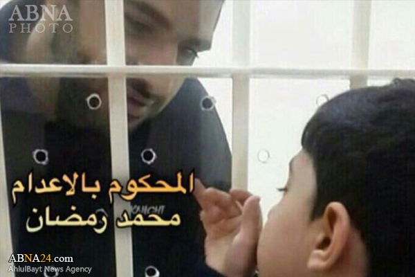 بوسه زندانی محکوم به اعدام به گونه فرزندش از پشت شیشه + عکس