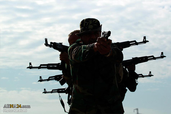 بازداشت یک تروریست داعشی ملبس به لباس زنانه + عکس