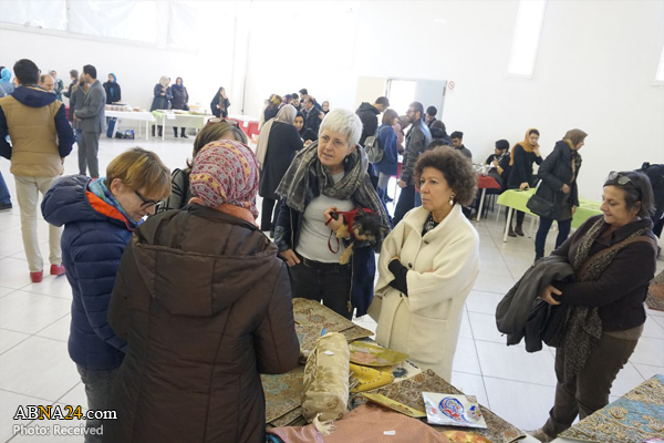 بازارچه خیریه کمک به زلزله زدگان کرمانشاه در میلان ایتالیا + عکس