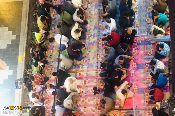 عکس خبری/ افطار جمعی در خیابانی در جوار کاظمین(ع)