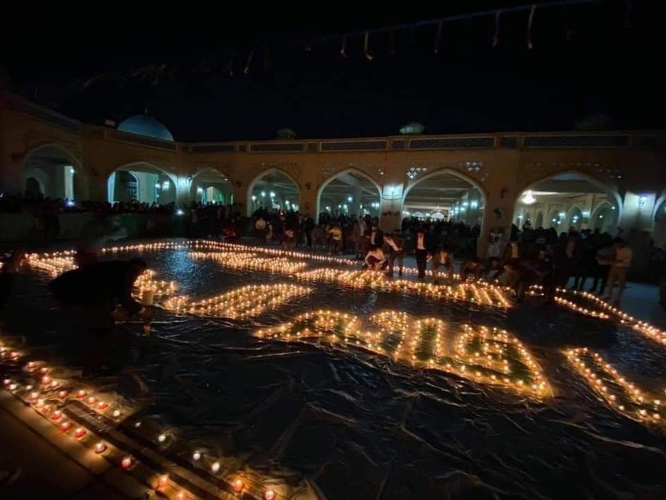 روشن کردن ۱۱۸۷ شمع در مسجد سهله + عکس