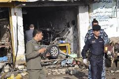 Bombs hit cities across Iraq, Over 22 killed, 2nd update