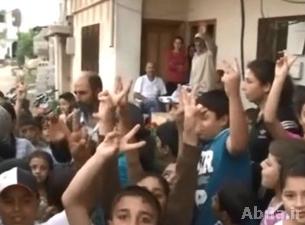 اهالي الغسانية يهللون بنصر الجيش السوري