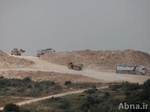 انتهاك أرض فلسطينية وتحويلها إلى طريق للمستوطنين