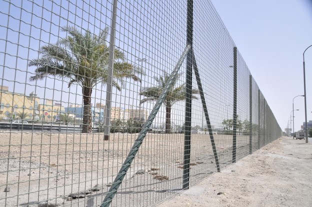 Blockades separating residential areas remind Bahrainis of the “apartheid wall”