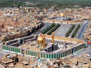 بالصور / مرقد الإمام الحسين بن علي وأخيه أبي الفضل العباس (ع) بكربلاء المقدسة