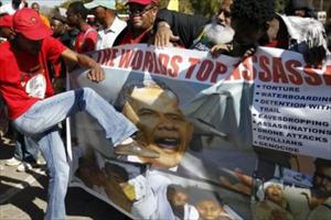 South Africa: Anti-US Protestors Burn Posters Of US President Barack Obama