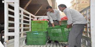 Imam Hussein holy shrine distributes foodstuffs to the decent poor families in Kerbala Province