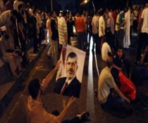 مرسي کي رہائي اورحکومت کي بحالي کا مطالبہ