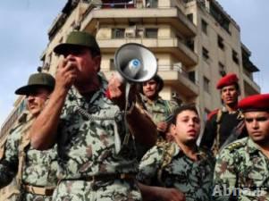 أنصار مرسي يحتجزون 4 جنود أمن مركزي أثناء اشتباكات شارع النصر