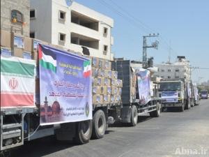 بالصور / مؤسسة الإمام الخميني (رض) الايرانية للاغاثة توزع 40 ألف سلة غذائية في غزة