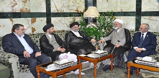 Delegation from Imam Kadhim & Imam Ali shrines honored by visiting Imam Hussein shrine