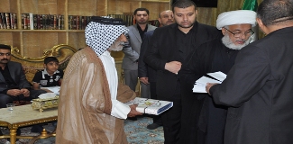 Secretary-General of the Imam Hussein holy shrine rewards the families of martyrs in Kerbala Province