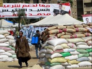 بالصورة / تحصينات أنصار مرسي من "أكياس الرمل" لتأمين "رابعه"