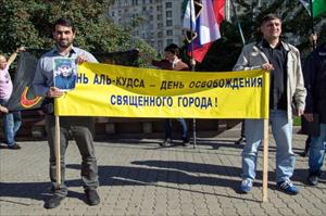 Москвада "Гүдс ҝүнү" митингиндә Һиҹаб Мәһбусларынын шәкилләри диггәт чәкди + Фото