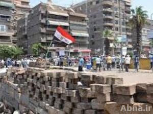 الإخوان يرفعون راية التحدى ويحصنون اعتصامهم في رابعة العدوية بجدار خرساني وآخر رملي