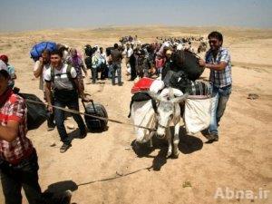 الجوع والخوف يجبر أكراد سوريا للهرب الى العراق