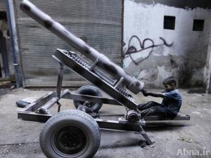 بالصور / الطفل عيسى ميكانيكي لما يسمى بـ " الجيش الحر "