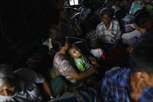 Terrified Muslim families hide in western Myanmar after elderly woman killed by Buddhist mobs