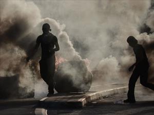 Bahrain police fire tear gas at protesters