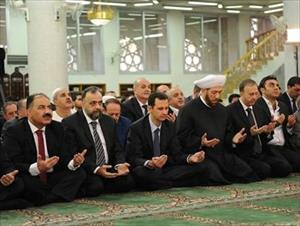 Assad prays at Damascus mosque for Eid al-Adha