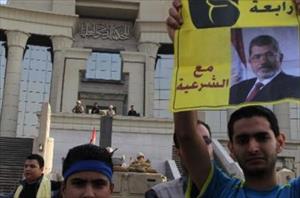 Egypt court adjourns Morsi trial until Jan. 8