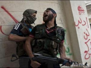القاعدة تقطع رأس مقاتل من الجيش الحر خطأ لاعتقادها انه شيعي