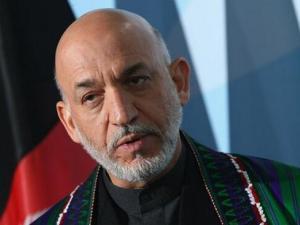 كرزاي في طهران في وقت تتعرض كابول لضغوط اميركية