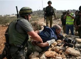 Report: 230 Israeli violations against journalists in 2013