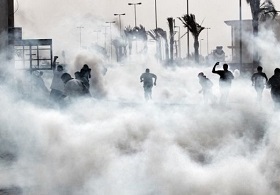 Bahrain police fire tear gas inside protesters' houses