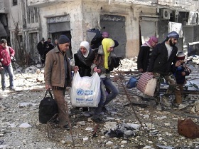 Civilians Evacuated from Syria’s Homs despite Terrorists’ Fire