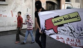 Bahrain police attack protesters with tear gas, stun grenades