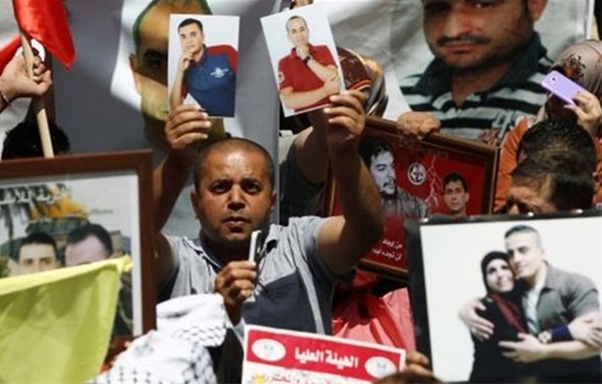 Thousands March across West Bank, Gaza to Mark Prisoners Day