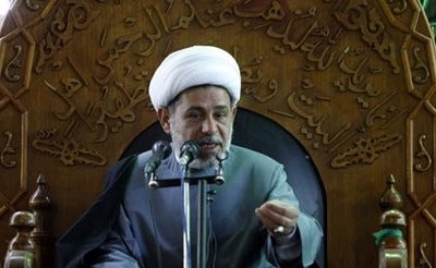 بالصور / الخطيب الحسيني "الابراهيمي" يحمل سلاحا مع المتطوعين لقتال داعش الارهابي