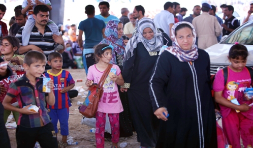 داعش تُهجر 200 عائلة شيعية من الموصل