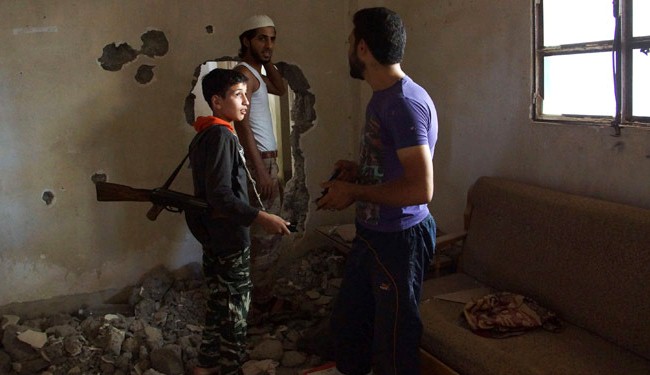 Human Rights Watch condemned takfiri militants for recruiting kids in Syria war