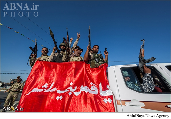 بالصور / استعراض عسكري لفرقة العباس (ع) القتالية في كربلاء للدفاع عن العراق والعتبات المقدسة 