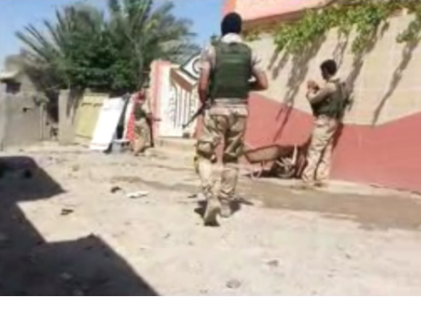 الجيش العراقي يحاصر عدد من الدواعش في احدى الدور ويقضي عليهم بقضاء تلعفر