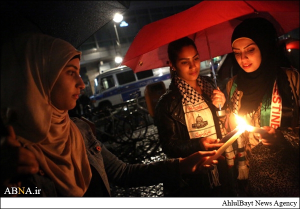 تصویری رپورٹ: برلین میں غزہ کے شہداء کی یاد میں موم بتیاں جلائی گئیں