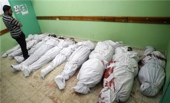 Palestinians finally bury their dead in Gaza sands