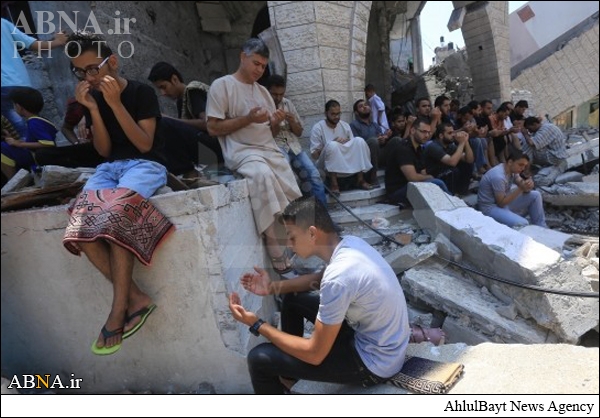 In Photos: Palestinians perform Friday prayers outside bombed Mosque