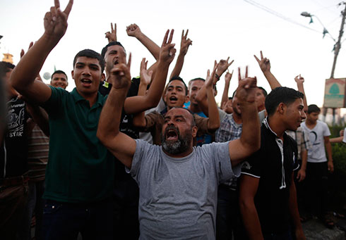 Gaza residents celebrate Hamas 'victory' over Israel + Photos