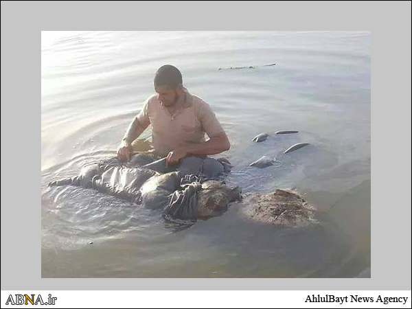 بالصور / انتشال جثث ضحايا "مجزرة سبايكر " الطافية على سطح النهر