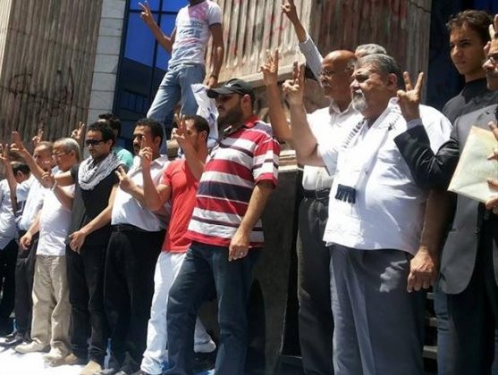 وقفة احتجاجية لصحفيين ونشطاء يطالبون بإلغاء قانون التظاهر في مصر