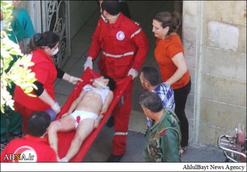 حمص میں دہشت گردانہ حملوں کی مذمت + تصویر