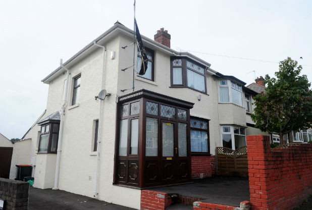 UK Shiite Muslim Mum flying al-Abbas black flag outside home tells neighbours it's definitely not a show of support for IS