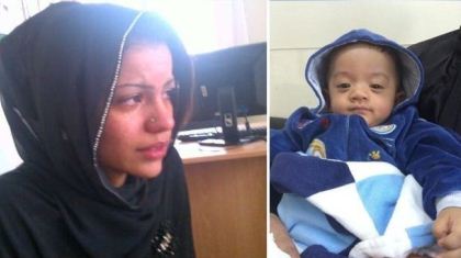 Al Khalifa tenant un bébé 6 mois